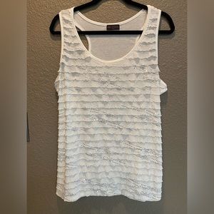 Women’s short sleeve tank top with ruffles on the front and silver embellishment
